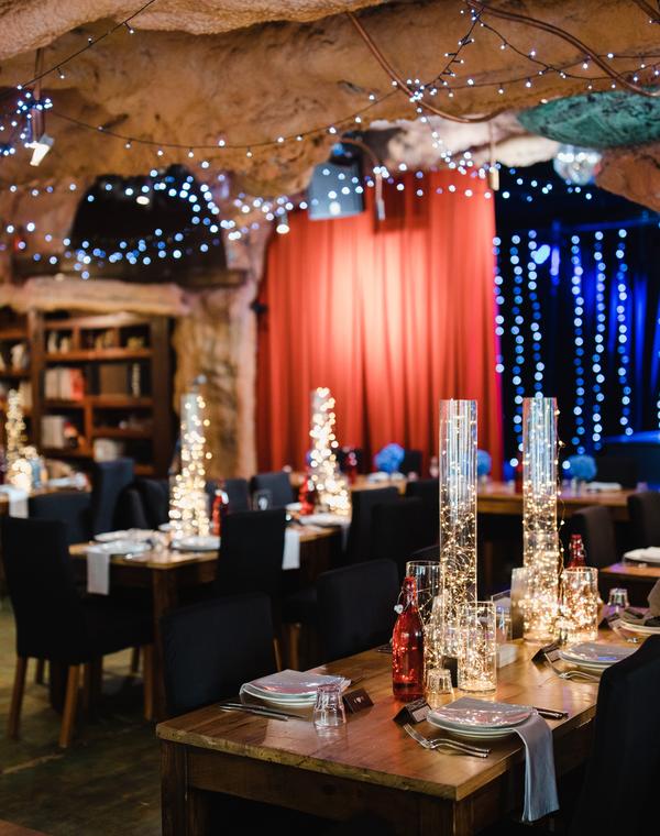 Wedding reception table setting in the grotto room at The Playhouse Café & Theatre, Nelson